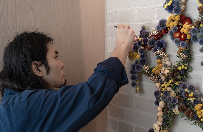 Syo Tanii and his art in the lobby